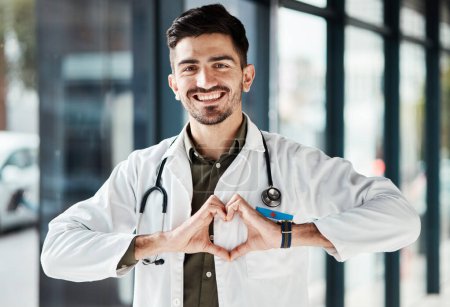 Photo for Happy portrait man, doctor and heart hands for healthcare love, medical service trust and hospital support. Cardiology, emoji health icon and male surgeon for wellness, clinic help or life insurance. - Royalty Free Image