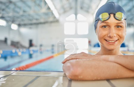 Photo for Portrait, woman in water and swimming pool for competition, training or professional sports or exercise in gym or club. Swimmer, smile or happy from winning, achievement or wellness in cardio workout. - Royalty Free Image