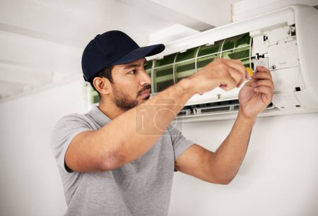 Photo for Maintenance, air conditioner technician and man with screwdriver working on ventilation for ac repair. Contractor, handyman or electric aircon machine expert problem solving, electrician with tools - Royalty Free Image