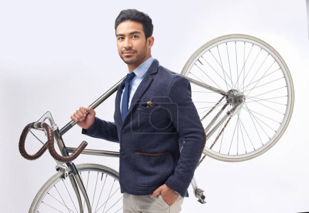 Photo for Business man, bicycle and studio portrait with retro suit, sustainable transport or pride by white background. Young entrepreneur, vintage fashion and bike for travel, transportation and eco friendly. - Royalty Free Image