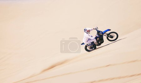 Photo for Bike, sports and mockup with a man in the desert for fitness or adrenaline hobby for freedom. Motorcycle, training and summer with an athlete riding a vehicle in Dubai for energy from above on space. - Royalty Free Image