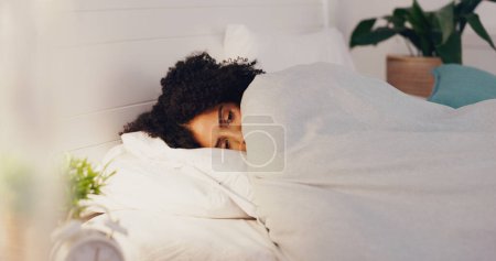 Photo for Woman, bed and insomnia anxiety or restless for sleep or rest in home bedroom with fatigue or stress. Female person frustrated with sleeping problem, depression or disorder while dreaming or sleeples. - Royalty Free Image