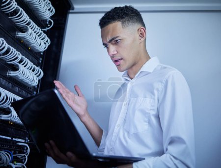 Photo for Laptop problem, server room technician and man react to software glitch, system fail or online database error. Cybersecurity risk, programmer and male IT specialist stress over datacenter virus. - Royalty Free Image