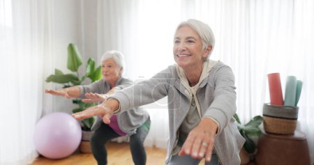 Photo for Fitness, yoga and senior woman friends in a home studio to workout for health, wellness or balance. Exercise, zen and chakra with elderly people training for mindfulness together while breathing. - Royalty Free Image