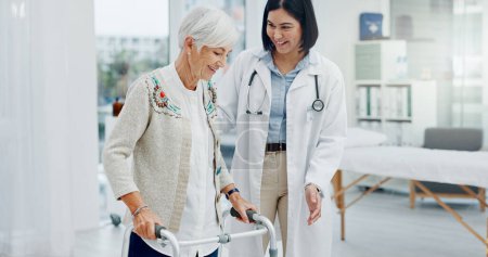 Photo for Support, doctor and senior woman in walking frame for healthcare service, muscle health or rehabilitation. Nurse, medical physiotherapy of elderly patient with disability, Parkinson or clinic helping. - Royalty Free Image