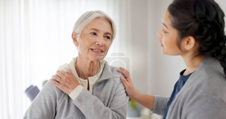 Photo for Consultation, physical therapy and senior woman with a nurse in a medical clinic or rehabilitation center. Healthcare, wellness and elderly female patient talking to a physiotherapist at a checkup - Royalty Free Image