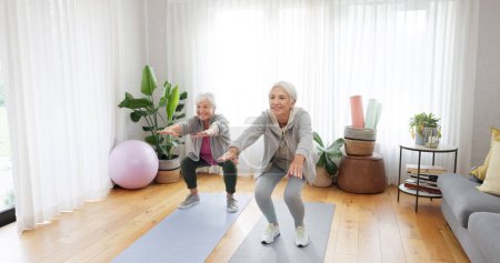 Photo for Fitness, yoga and elderly woman friends in a home studio to workout for health, wellness or balance. Exercise, zen and chakra with senior people training for mindfulness together while breathing. - Royalty Free Image