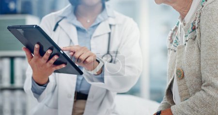 Photo for Tablet, doctor hands and people for healthcare information, test results and support or helping. Typing, search and medical professional with patient charts on digital technology for clinic services. - Royalty Free Image
