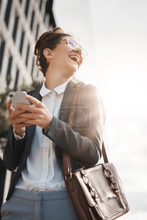 Photo for Business, city and woman with a smartphone, funny or travel with internet connection, happiness or email. Female person, humor or consultant with a cellphone, mobile app or outdoor with social media. - Royalty Free Image