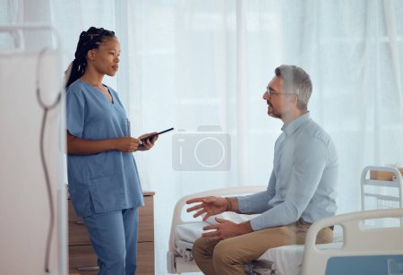 Photo for Man, talking or nurse in consultation in hospital speaking, listening or talking about medical problem. Question, explain or doctor in healthcare clinic helping or nursing a sick person for support. - Royalty Free Image