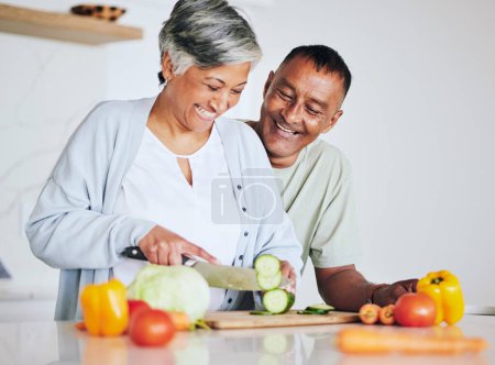 Photo for Love, health and cooking with old couple in kitchen for food, lunch and helping. Wellness, nutrition and diet with senior man and woman cutting vegetables at home for retirement, dinner and relax. - Royalty Free Image