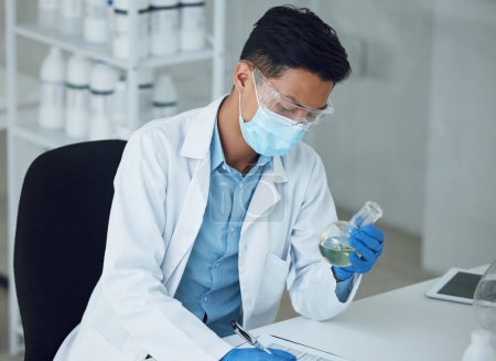 Photo for Science, laboratory and man with chemical for doctor research and study in clinic. Lab notes, liquid analysis and healthcare professional with innovation and solution for virus test of scientist. - Royalty Free Image