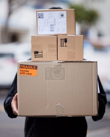 Photo for Person, cardboard and boxes delivery or courier service for shopping, logistics or supply chain management outdoor. E commerce, cardboard package and product for urban city shipping and stock worker. - Royalty Free Image