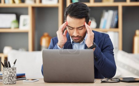 Photo for Headache, stress and laptop with business man for fatigue, anxiety and burnout. Mental health, tired and frustrated with male employee and migraine pain in office for mistake, glitch and problem. - Royalty Free Image