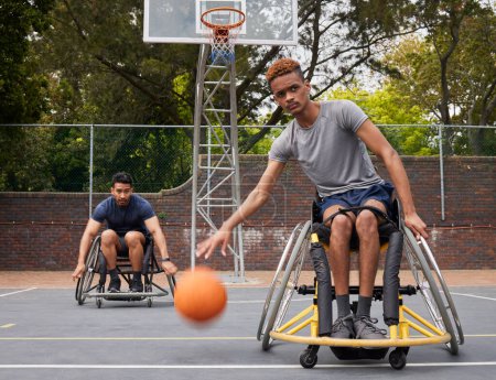 Photo for Sports action, wheelchair basketball or man focus on match competition, outdoor court challenge or fitness. Determined player, dribbling ball or African athlete with disability, training and exercise. - Royalty Free Image