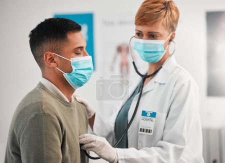Photo for Doctor, face mask or woman with man breathing for healthcare, nursing or clinic cardiology. Wellness services, cardiology or medical worker checking heart beat with listening equipment in hospital. - Royalty Free Image