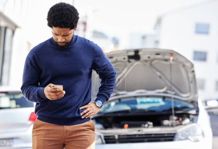 Photo for Black man with phone, car breakdown and typing in road with contact, auto insurance and travel. Motor problem, transport and frustrated driver on road checking mobile app for engine repair service - Royalty Free Image