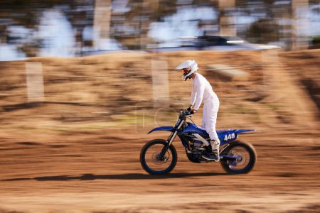 Photo for Sports, motorbike and man in the countryside for fitness, adrenaline and speed training outdoor. Dirt road, bike and male driver on motorcycle with freedom, performance and moto hobby stunt in nature. - Royalty Free Image