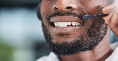 Photo for Mouth, man and communication for telemarketing in call center, customer service and advisory contact for CRM questions. Closeup face of happy sales agent, microphone and consultant of telecom support. - Royalty Free Image