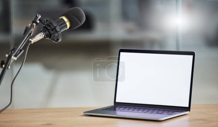 Photo for Laptop screen, mockup and microphone, radio or podcast with audio equipment, technology and marketing for show. Multimedia, communication and email with website design layout, news and about us on pc. - Royalty Free Image