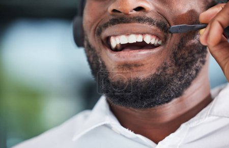 Photo for Mouth, man and smile for communication in call center, customer service and advisory contact for CRM questions. Closeup face of happy sales agent, microphone and laughing for telecom support. - Royalty Free Image