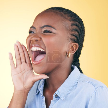 Photo for Shouting, announcement black woman in studio with motivation and voice from deal. Yellow background, female person and secret with big news and excited from advertising, marketing and promotion deal. - Royalty Free Image