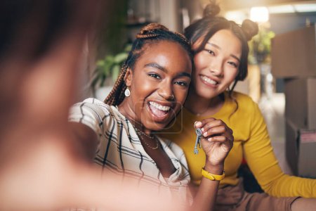 Photo for Selfie, couple of friends and keys to new home or moving in together for real estate investment. Rent, mortgage and loan of excited gay women with smile for social media portrait at apartment house. - Royalty Free Image
