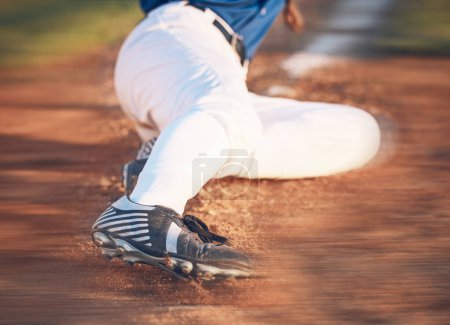 Photo for Slide, baseball action and athlete in a dirt for game or sports competition on pitch in stadium. Person, ground and tournament performance by athlete or base runner in training, exercise or workout. - Royalty Free Image