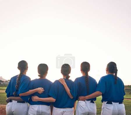 Photo for Women, team and softball, sports and support, fitness and back view with mockup space and athlete group together. Sunset, sky and solidarity, trust and exercise with baseball player people outdoor. - Royalty Free Image