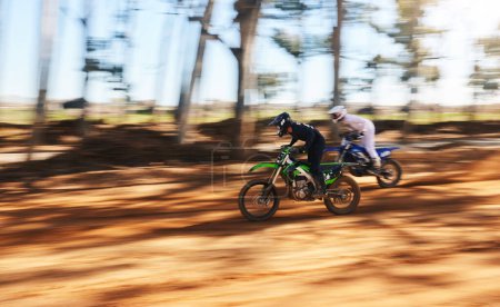 Photo for Race, motorbike and sports, men with speed for practice and training in fast adventure. Professional dirt biking, motion blur and off road motorcycle competition, performance and challenge in woods - Royalty Free Image