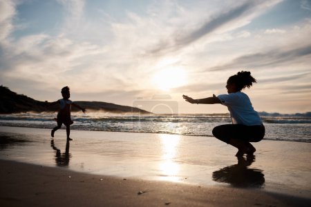 Photo for Child is running to mother, beach and silhouette, family with games and love, travel and freedom together outdoor. People, sunset and adventure, woman and girl bonding on tropical holiday and nature. - Royalty Free Image