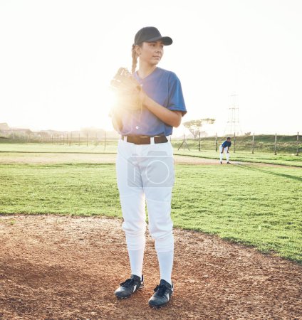 Photo for Baseball, pitcher and sports person outdoor on a pitch for performance and competition. Professional athlete or softball woman thinking of a game, training or exercise challenge at field or stadium. - Royalty Free Image
