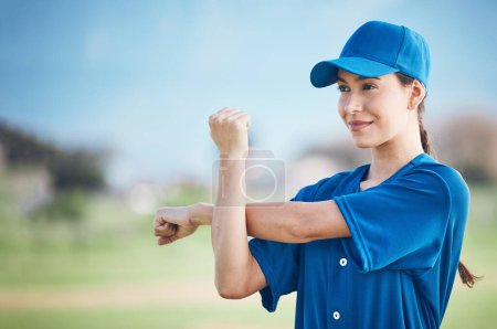 Photo for Baseball, fitness and woman stretching, game and training in uniform, exercise and health. Person, softball player and athlete stretch arms, competition and warm up for match with wellness and sports. - Royalty Free Image