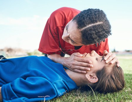 Photo for CPR, breathing check and saving woman on field for sport, fitness and game with accident and emergency. Training, paramedic and listening to lungs for breathe from injury with first aid and athlete. - Royalty Free Image