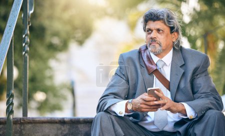Photo for Phone, thinking and a business man on steps in the park during a work break for communication. Mobile, idea and mockup with a mature employee looking worried after job loss in a financial crisis. - Royalty Free Image