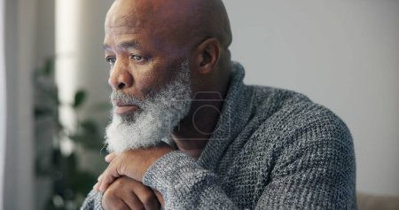 Photo for Depression, sad and senior man at home with mourning and memory with mental health problem. Elderly male person, sorry and anxiety in a house feeling disappointed in retirement with grief and fail. - Royalty Free Image