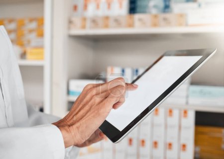 Photo for Person, pharmacist and hands with tablet screen for inventory inspection or checking stock at pharmacy. Closeup of medical or healthcare worker with technology app display or mockup in pharmaceutical. - Royalty Free Image