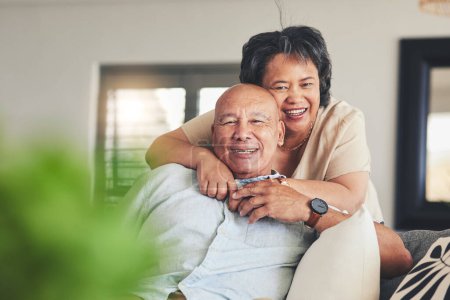 Photo for Portrait, senior or happy couple hug to relax on house sofa bonding with trust, love or loyalty together. Smile, joy or mature woman with support, care or elderly man on couch at home in retirement. - Royalty Free Image