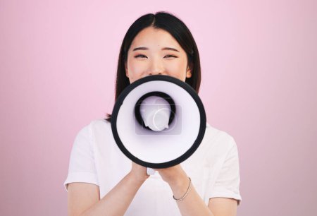 Photo for Megaphone announcement, portrait and Asian woman with retail sales discount, promotion deal or broadcast news. Speech, studio or Japanese speaker noise, attention and voice opinion on pink background. - Royalty Free Image