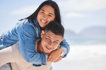 Photo for Summer, piggyback and portrait of a couple at the beach for a date, love or vacation together. Mockup, smile and a man and woman with a hug at the sea for a holiday, travel or bonding in marriage. - Royalty Free Image
