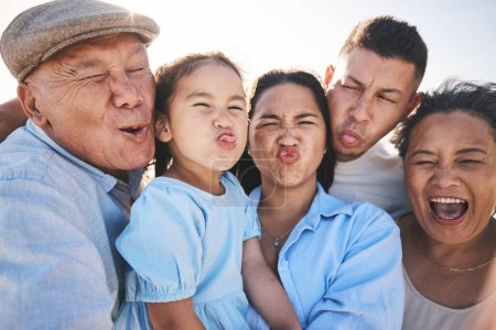 Photo for Funny, selfie and child with grandparents and parents in nature on a vacation, adventure or holiday. Comic, goofy and family generations taking a picture with silly faces by a sky on a weekend trip - Royalty Free Image