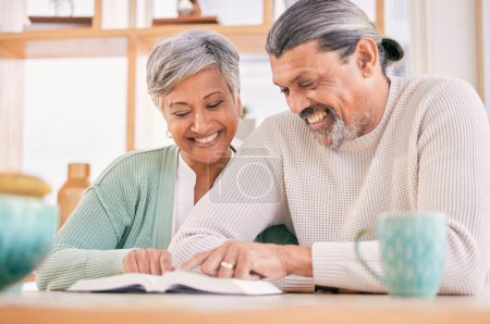 Photo for Reading, book and senior couple smile at home with bible study and religion together in marriage. House, happy and elderly people with worship, learning and christian conversation with love and care. - Royalty Free Image