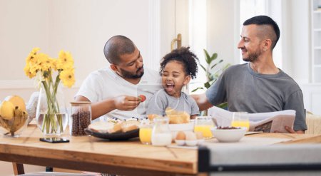 Photo for Gay couple, breakfast and parents feeding kid meal, food or strawberry for morning wellness, nutrition and development support. Healthy family, home fruit and homosexual father smile for hungry child. - Royalty Free Image