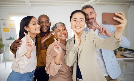 Photo for Selfie, smile and group of business people with peace for support, team building and emoji. Diversity, employees and happy friends with v sign for digital profile picture about us on social media. - Royalty Free Image