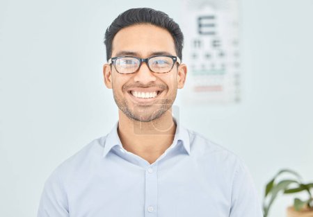 Photo for Man, face or glasses for vision, eye exam or optometry in clinic wellness, health or prescription frames. Happy, person, portrait or Mexican patient in optician, ophthalmology and eyesight assessment. - Royalty Free Image