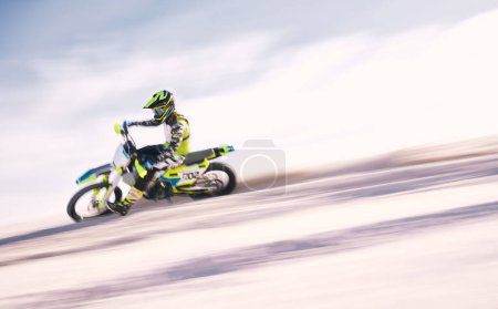 Photo for Bike, mockup and motion blur with a man on sand riding a vehicle in the desert for adventure or adrenaline. Motorcycle, freedom and training on space with an athlete on space in nature for power. - Royalty Free Image