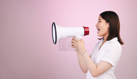 Photo for Megaphone announcement, studio or profile woman with sales discount, promo deal or breaking news audio. Advertising speech, mockup space or female speaker noise, attention or voice on pink background. - Royalty Free Image