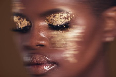 Photo for Gold beauty, blurred and black woman with face closeup with makeup and cosmetics in studio. Brown background, African female model and glitter with golden shine and glow from facial paint sparkle. - Royalty Free Image