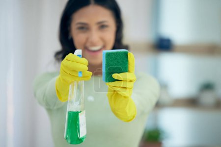 Photo for Cleaning, spray and hands of woman with sponge for disinfection, hygiene and housekeeping. Housework, maid service and woman with sanitizer products, liquid and detergent for dirt, dust and washing. - Royalty Free Image