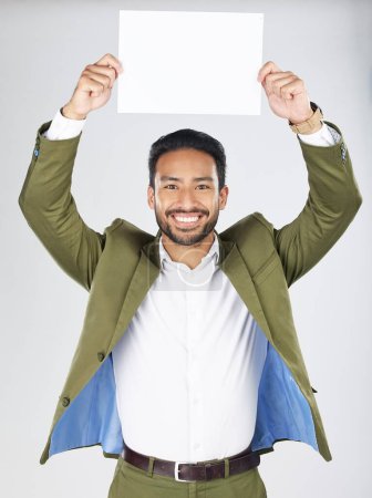 Photo for Happy asian man, portrait and billboard in advertising, marketing or branding against a white studio background. Businessman smile with paper, poster or sign for message or advertisement on mockup. - Royalty Free Image